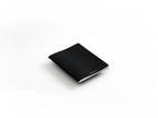 Black Tag Half-Sized Journal: Ruled